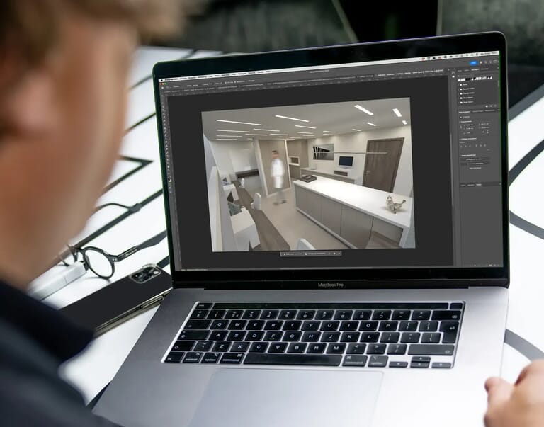 Iemand kijkt naar een laptop met een 3d visualisatie