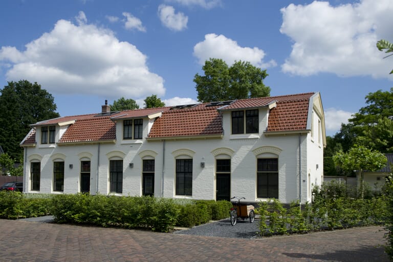 Restaureren en samenvoegen van drie woningen