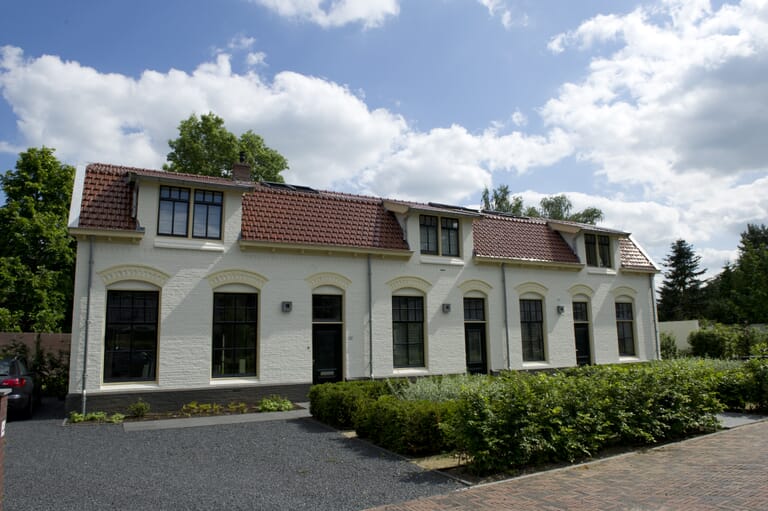 Restaureren en samenvoegen van drie woningen