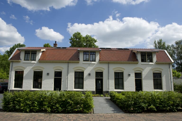 Restaureren en samenvoegen van drie woningen