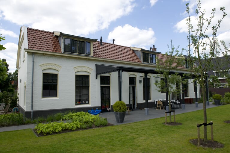 Restaureren en samenvoegen van drie woningen