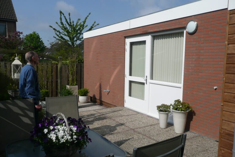 Pasaan zorgaanbouw foto
